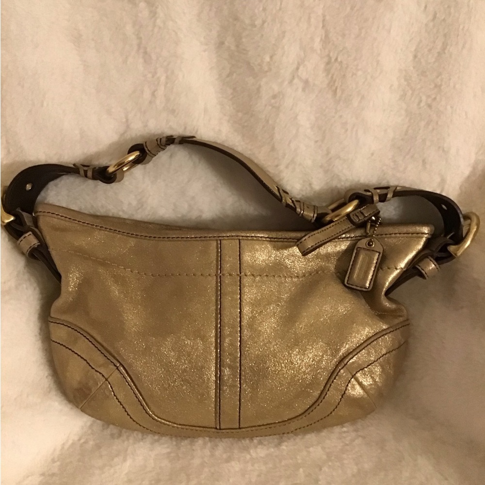Gold coach shoulder purse